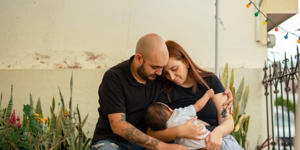 Parent holding young child